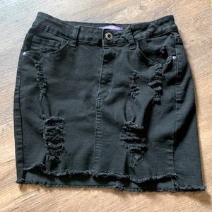Black, distressed, super stretchy skirt.